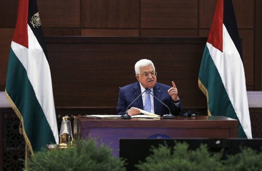 Palestinian leader Abbas lands in Algeria 
